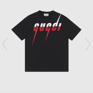 Authentic gucci  T-shirt with Gucci Blade print
